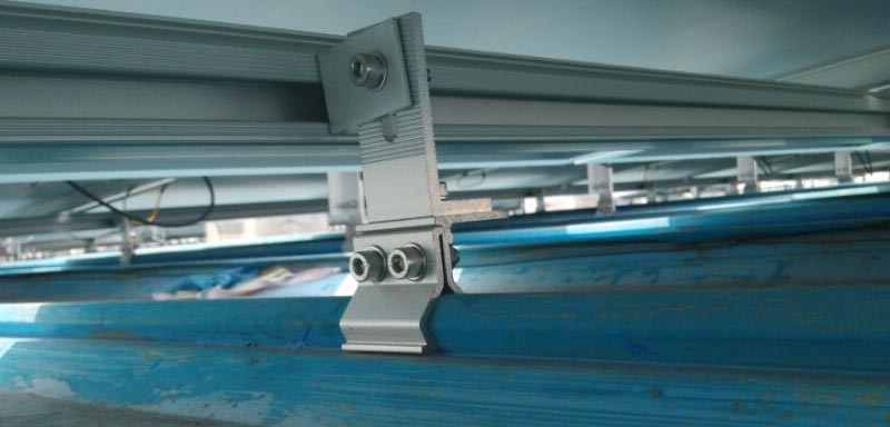 Standing seam roof clamps and rails